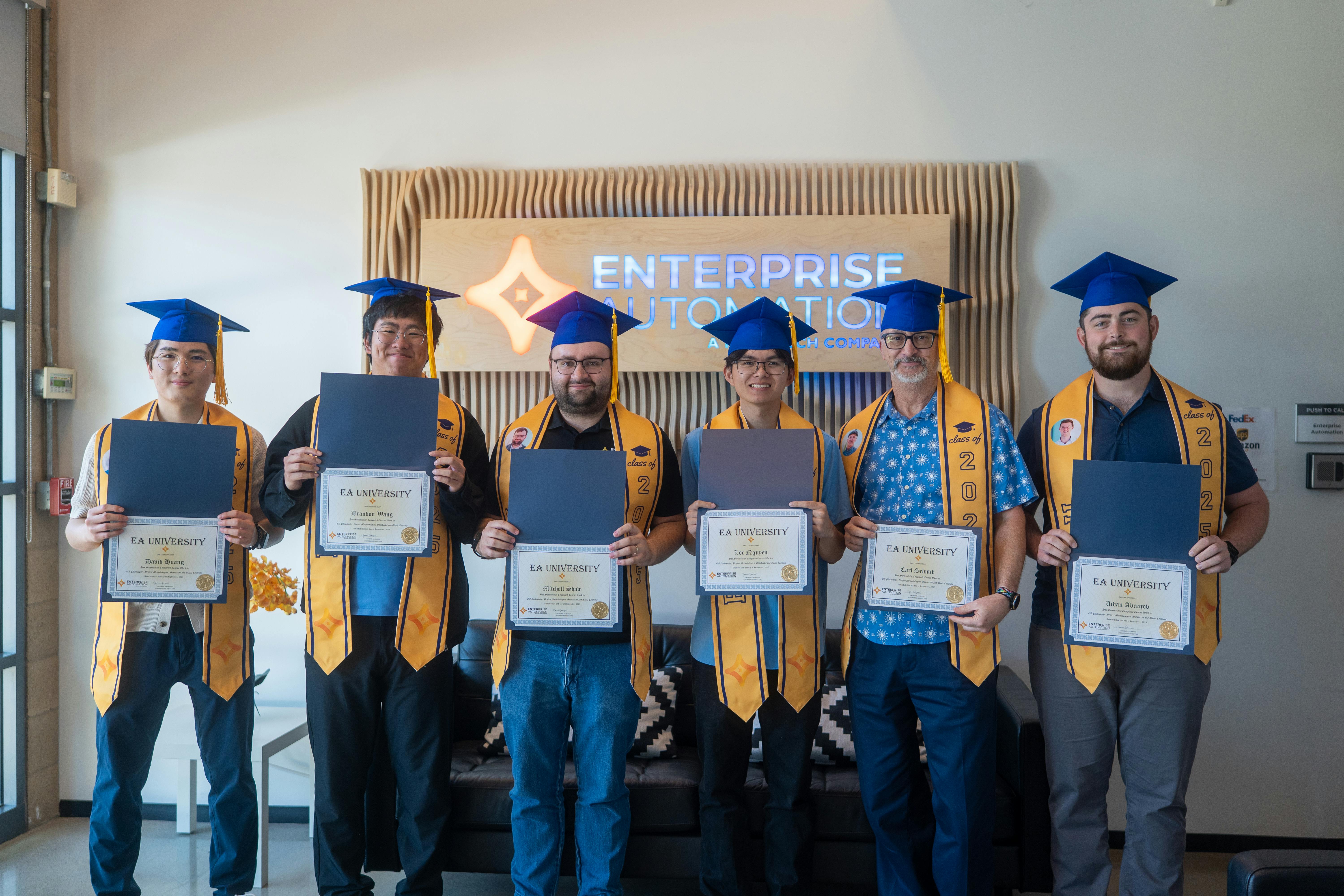 Figure 2: The 2025 graduating class at Enterprise Automation&rsquo;s inhouse EA University (EAU) included (1. to r.) David Huang, controls engineer I, Brandon Wang, controls engineer I, Mitchell Shaw, controls engineer III, Loc Nguyen, controls engineer I, Carl Schmid, senior engineer, and Aidan Abregov, electrical design drafter I. Source: Enterprise Automation