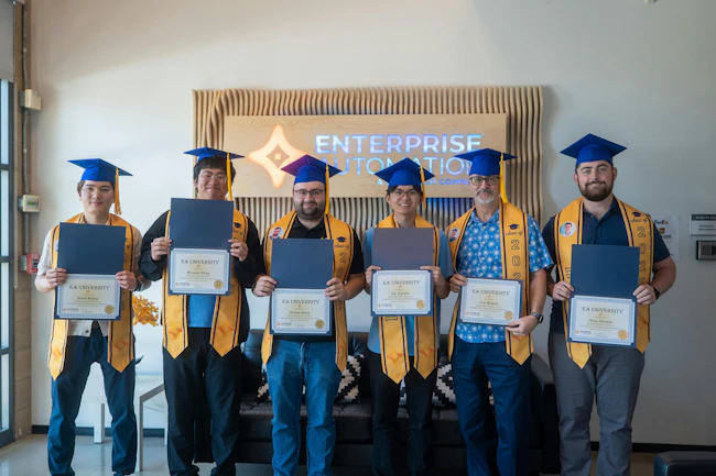 Figure 2: The 2025 graduating class at Enterprise Automation&rsquo;s inhouse EA University (EAU) included (1. to r.) David Huang, controls engineer I, Brandon Wang, controls engineer I, Mitchell Shaw, controls engineer III, Loc Nguyen, controls engineer I, Carl Schmid, senior engineer, and Aidan Abregov, electrical design drafter I. Source: Enterprise Automation