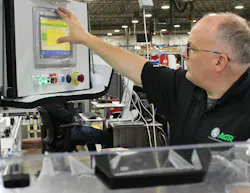 Bill Trotta-Smith, control systems engineer at Arthur G. Russell Co., adjusts a human-machine interface (HMI) on an automated system. AGR reports that he exemplifies the career longevity possible in manufacturing, where opportunities to learn, develop new skills and advance can lead to a lasting career. Source: Arthur G. Russell