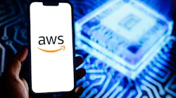 Amazon Web Services logo on a smartphone against the background a blue glowing AI chip